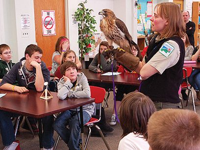 Interpreters lead a wildlife education and outreach program at a local area school